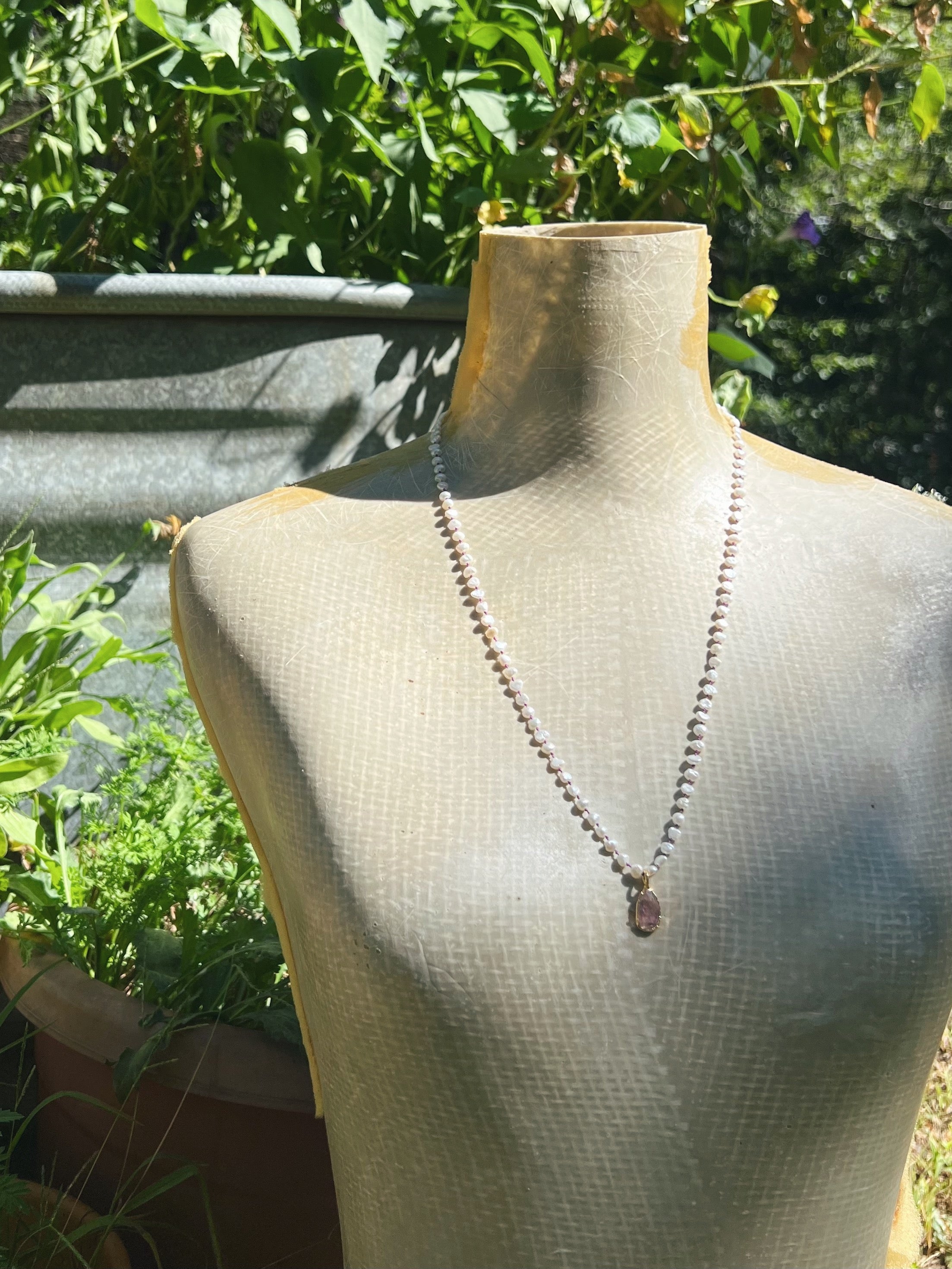 Pink Tourmaline in gold on white pearls Sea Ox