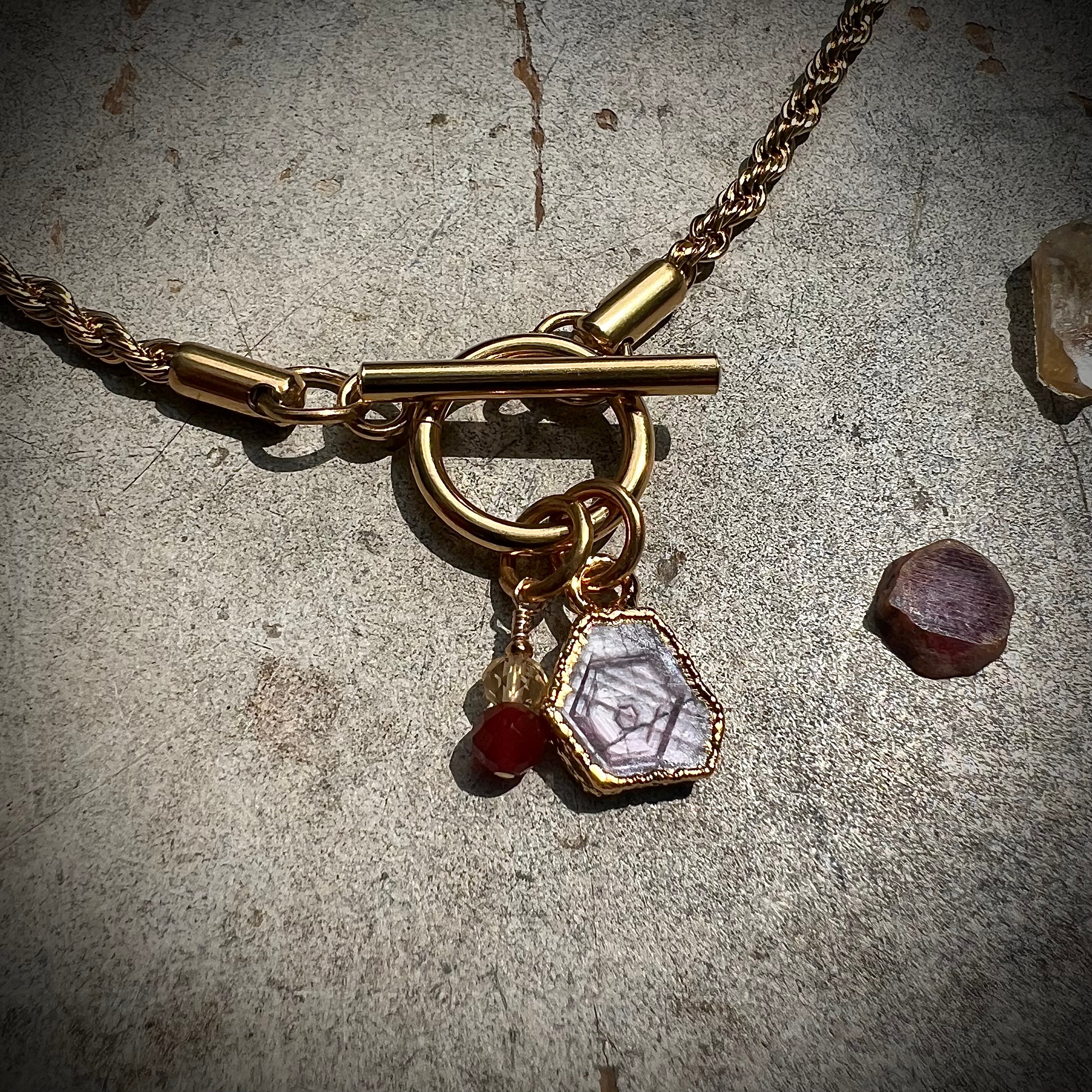 Star Ruby on gold chain