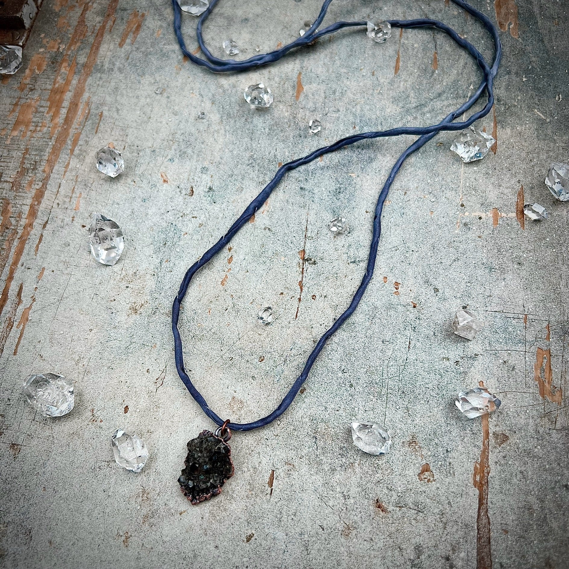 Delicate Druzy pendant on silk cord