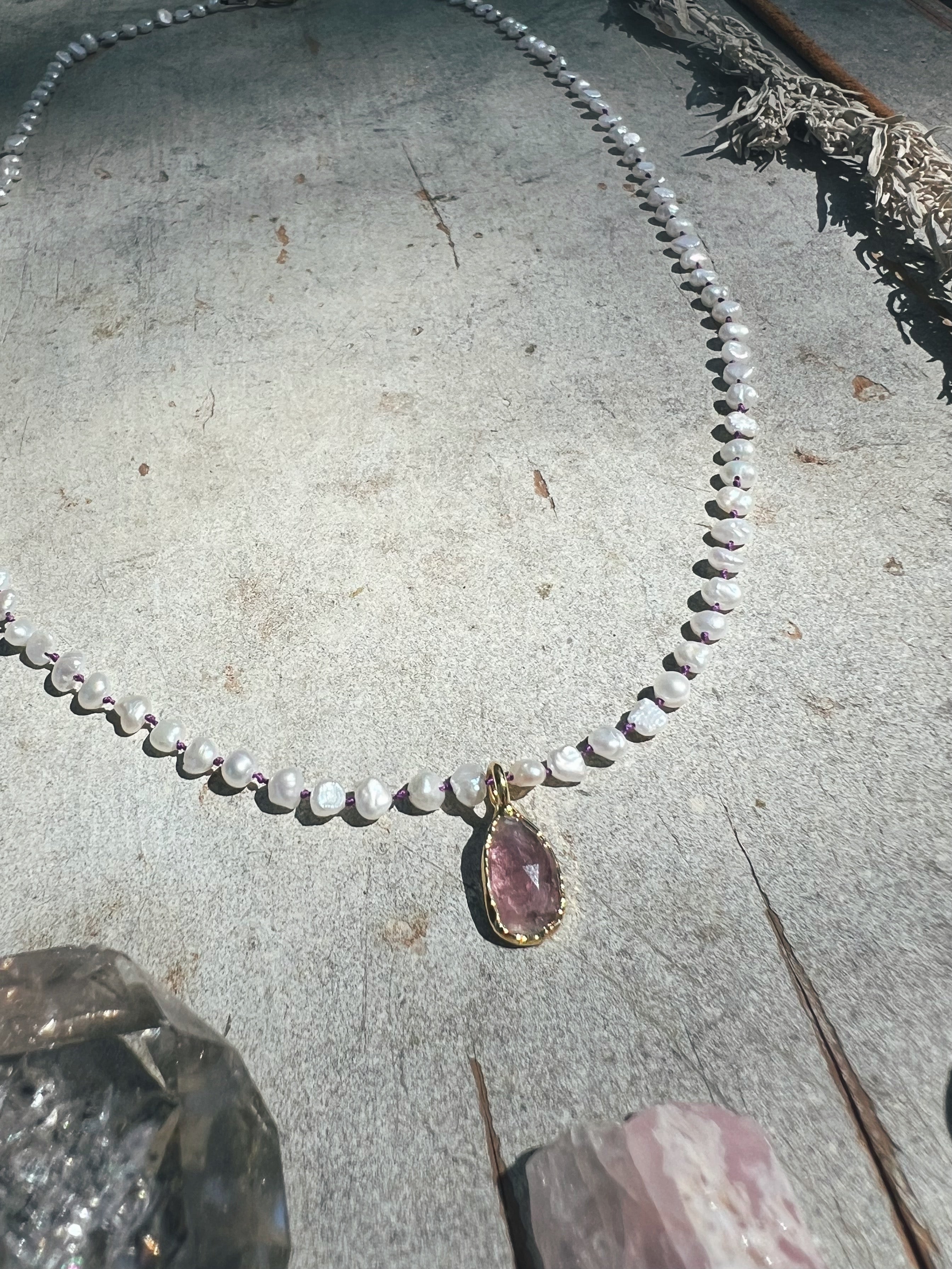 Pink Tourmaline in gold on white pearls Sea Ox