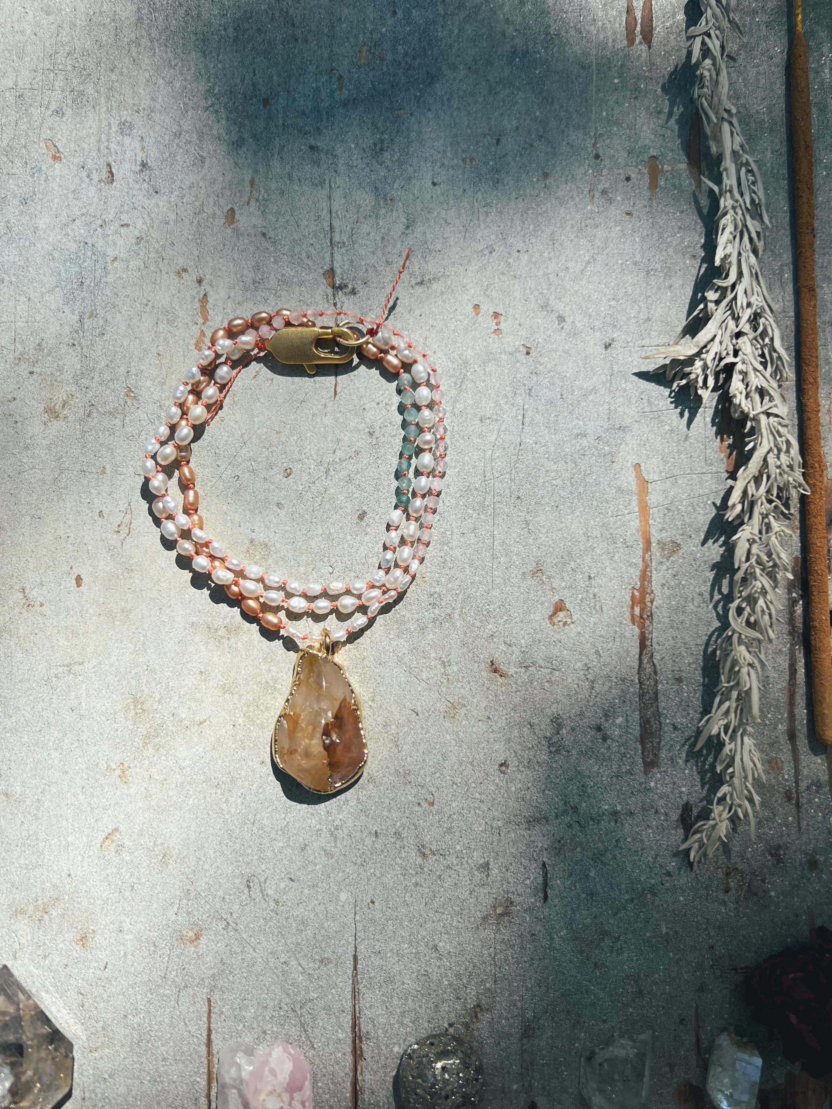 Golden Healer Quartz in gold, mixed pearl strand Sea Ox