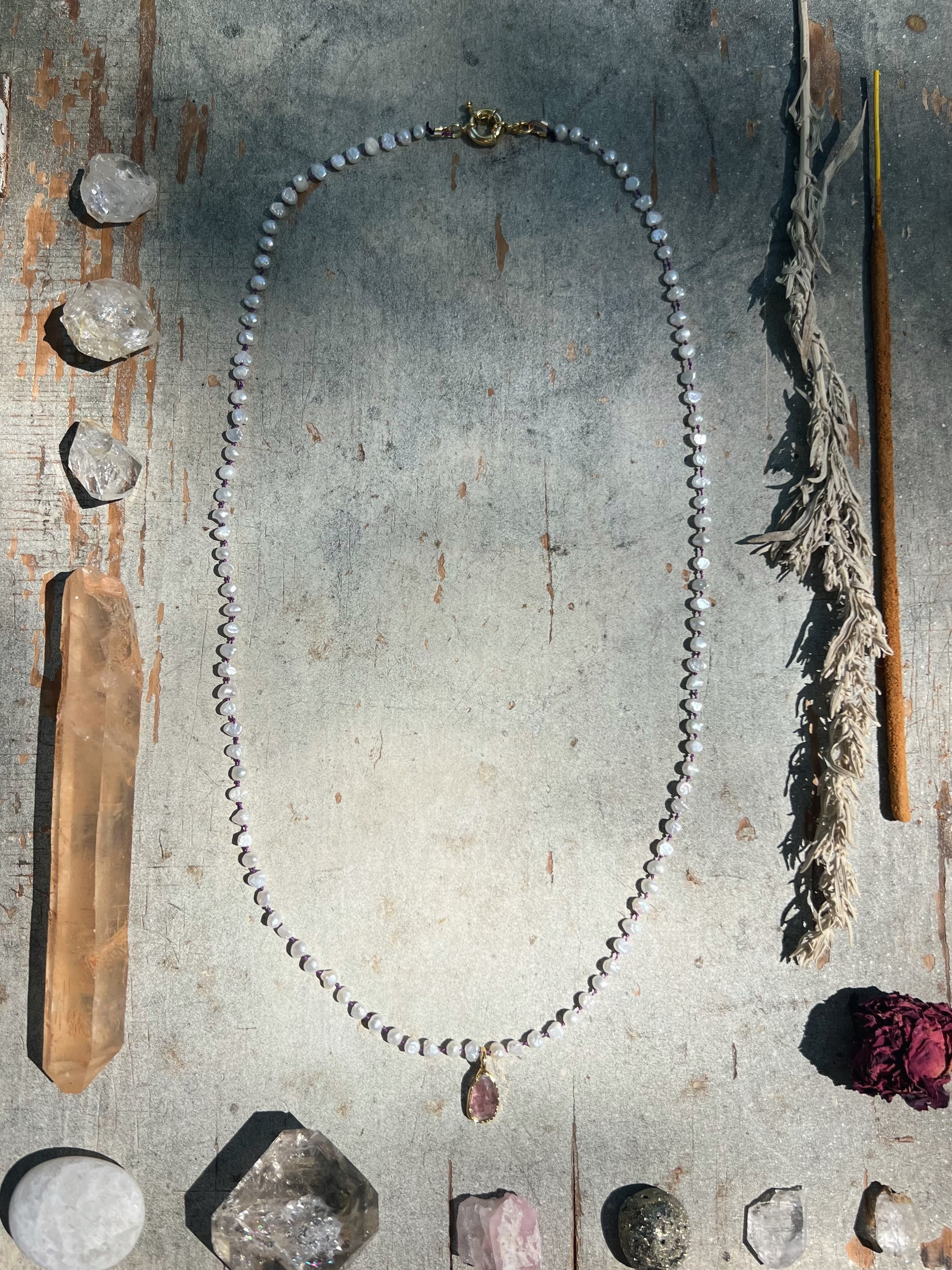 Pink Tourmaline in gold on white pearls Sea Ox