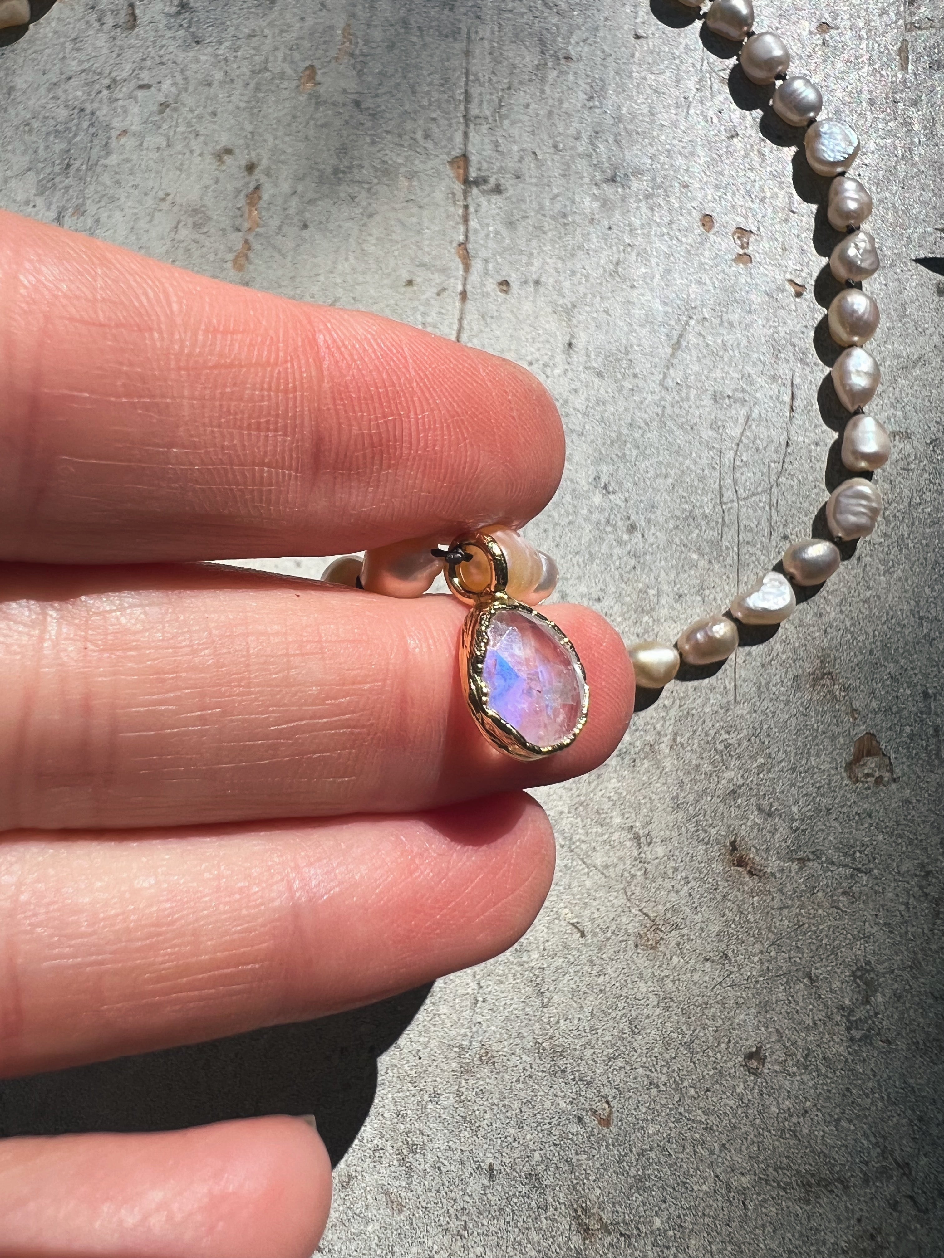 Moonstone in gold, white pearls Sea Ox